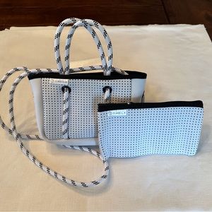 White neoprene crossbody bag with removable zipper purse. NWOT